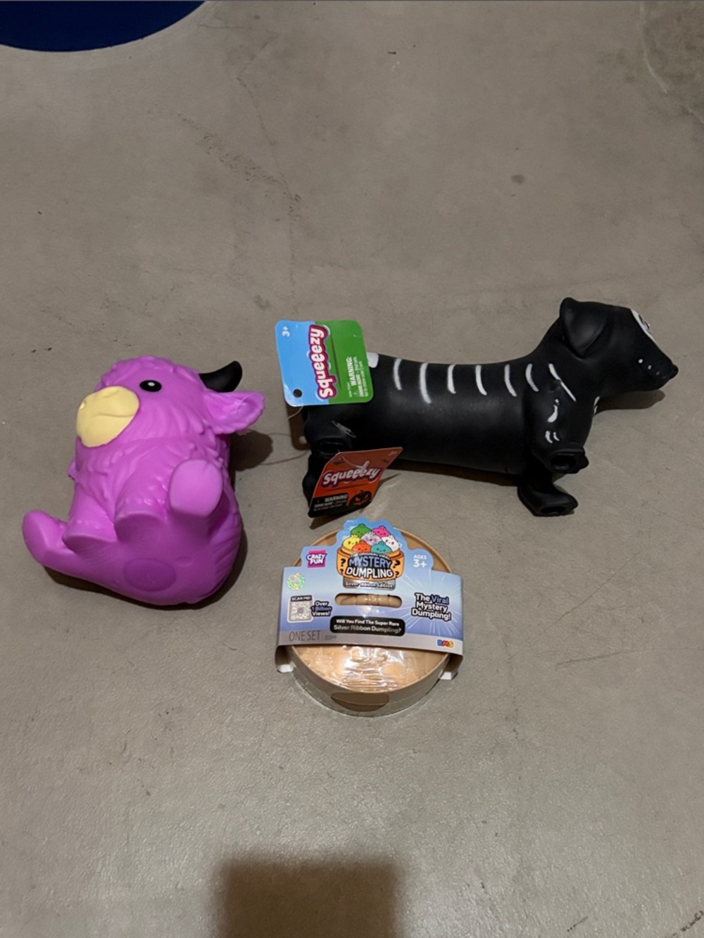 Squeeezy Black Halloween Skeleton Dog Purple Highland Cow Silver Ribbon Dumpling